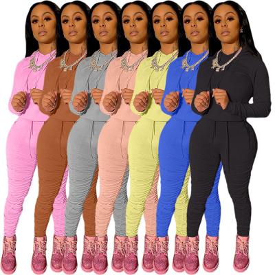 China wholesale KL181 Anti-wrinkle custom logo sweatpants and hoodie sets solid color women tracker suits two piece set for sale