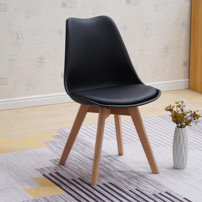 China Best Selling Modern Simple Design PP Plastic Chair Seat With PU Cushion Wooden Printing Legs Dining Chair for sale