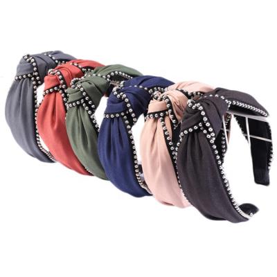 China Fashion News Fashion Hair Accessories Women's Cloth Solid Color Beaded BeadsTop Knot Hair Bands Cross Hair Band for sale