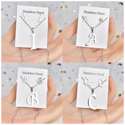 China 2022 Romantic CIA Fashion Stainless Steel 26 Silver English Letters Not Fade Earring Necklace Pendant Titanium Steel Jewelry Set for sale