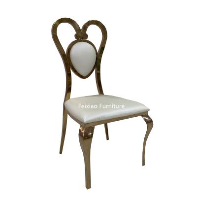 China Modern Stainless Steel Wedding Rose Gold Heart Shaped Chair With PU Leather Cushion for sale