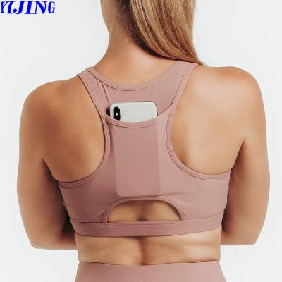 China Breathable Custom Ladies Sports Bra Racerback Padded Yoga Sports Bra Superior Fitness Eco-friendly Fabric for sale