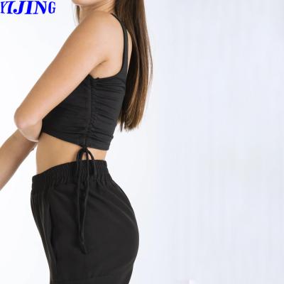 China Breathable hot selling flattering top special back figure crop hole women sports crop top for sale