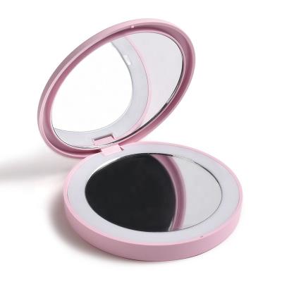 China Lighted Women Girls Makeup Illuminated Folding Mirror LED Travel Lighted Compact Mirror for sale