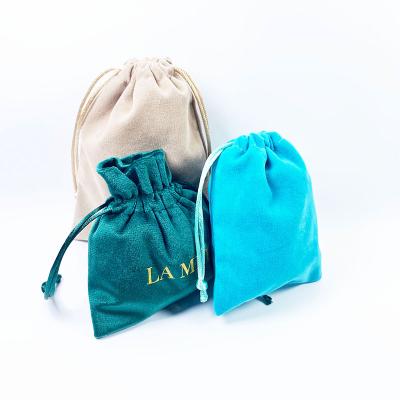 China Recyclable Wholesale suede drawstring bag custom logo velvet jewelry packaging pouch for sale