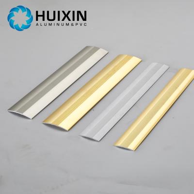 China Aluminium T shaped floor transition strips metal edged trim bronze metal tile trim for sale