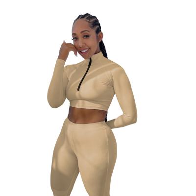 China Breathable Ladies Seamless Tight Sweater Set Navel Long Sleeve Sweater Pencil Pants Two Piece Set In Spot for sale