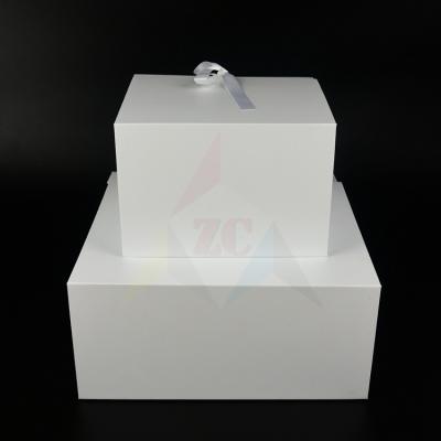 China Custom Handmade Wholesale White Rigid Flat Foldable Cardboard Magnetic Gift Box With Lid And Ribbon for sale