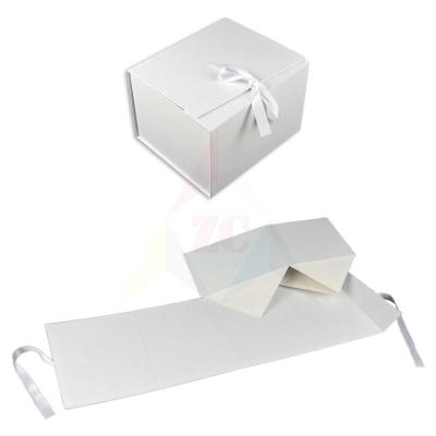 China New Arrival Simple Elegant Luxury Folding Package Gift Customized Box FO Logo Foldable Magnetic Closure Flat Handmade With Ribbon Handle for sale