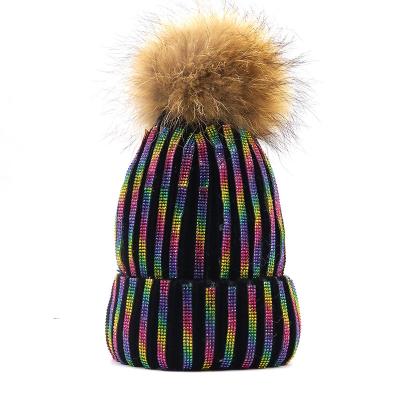 China JOINT Newest Designs Bling bling full rhinestone pom pom striped fur knit beanies for women for sale