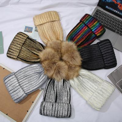 China Newest COMMON Winter Styles Faux Fur Pom Pom Mommy And Kid Beanies Bling Tan Bling Knitted For Women for sale