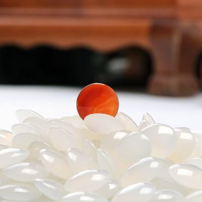 China Brainstorming Game Go Game Pieces High End Red Agate For Gathering And Entertaining Weiqi Stones for sale