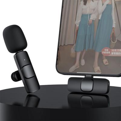 China Portable Headset Microphone Live Streaming Mini Lavalier Wireless Microphone For Mobile Phone for sale