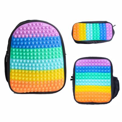 China Relieve Stress Anti-Anxiety In Actions Mini Custom Rainbow Silicone Bubble Actions Kids Adults Busy Person Toy Backpack Drop Shipping Sensory Bag For Boys Girls for sale