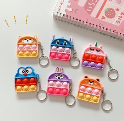 China Relieve Stress Anti-Anxiety Wholesale Relaxation Other Child Cartoon Anime Key Chains Manufacturers Dimple Cute Kawaii Silicon Pop Simple Busy Key Chain for sale