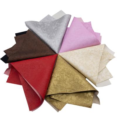 China Factory direct embossed synthetic flower PVC leather fabric waterproof for chair etc. upholstery decoration for sale