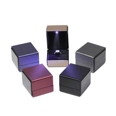 China Custom Logo Eco-friendly PU Leather Ring Gift Box Jewelry Packaging Box LED Jewelry Box for sale