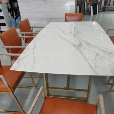 China Premium Materials Luxury Gold Decorative Nano White Marble Stone Phoenix Artificial Marble Table Tops for sale