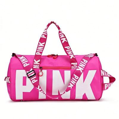 China 2022 Custom Large Capacity Logo Outdoor Fashion Ladies Unisex Shoulder Tote Pink Sport Travel Duffel Bag for sale