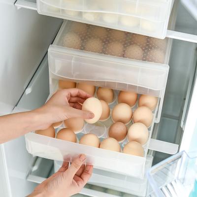 China Sustainable Plastic Refrigerator 34 Grids Preservation Kitchen Promotion Stackable Egg Box With Lid Egg Storage Container for sale