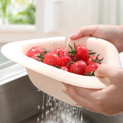 China Viable Multifunctional Sink Strainer Triangle Fruit And Vegetable Drain Basket Kitchen Sink Shelf for sale