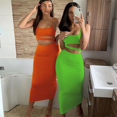 China 2021 New Arrivals Summer Cavity Viable Asymmetrical Black Women 2 Piece Outfits Skinny Sexy Two Piece Skirt Sets for sale