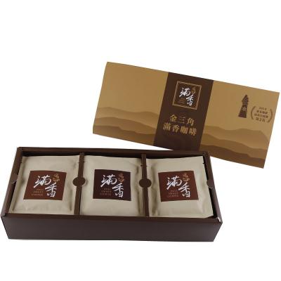 China Natural Magic Feeling Instant Drip Coffee Bag Thailand Triangle Gift Golden Bax for sale