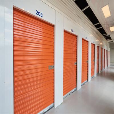 China Colored Galvanized Steel Heat Insulation Manual Self Storage Door Roll Up Door for sale