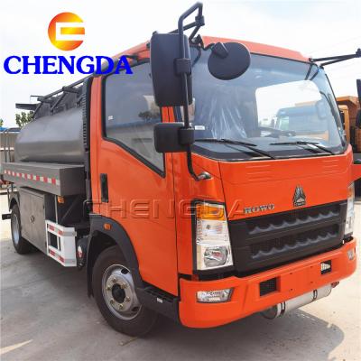 China HOWO 10000 liters steel manhole cover fuel tank truck 3 for sale for sale