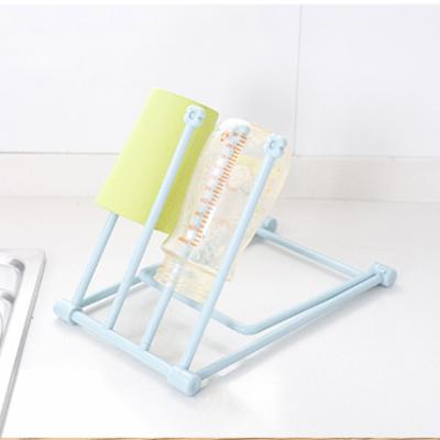 China Universal Multifunctional Foldable Kitchen Towel Rack Viable Hanging Rack Baby Bottle Drying Rack For Travel Kitchen for sale