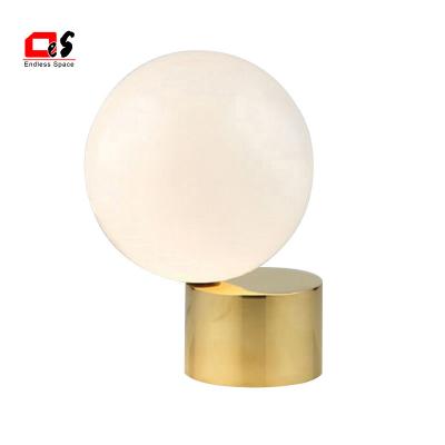 China Modern Led Table Lamp Modern White Glass Shade And Brass Metal Table Lamp Base Luxury for sale