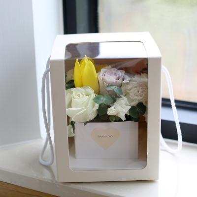 China Recyclable Rose Bouquet Flower Box Flowers Wholesale Gift Window Paper Bags Transparent Packaging Beauty Transparent Packaging Handbags for sale