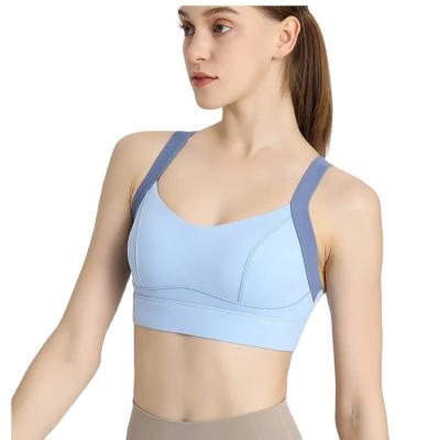 China Breathable High Strength Gym Vest with Buckle Bra Fixed Cup and Bra Pad Shockproof One-Piece Smooth Sports Bra for sale