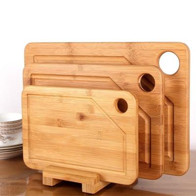 China Bamboo Kitchen Chopping Block Wood Cutting Board with Juice Groove 300x250x10mm Rectangle for sale