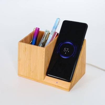 China Fast Bamboo Desktop Wireless Charger Stand with Pen Holder and Clock OEM Acceptable for sale