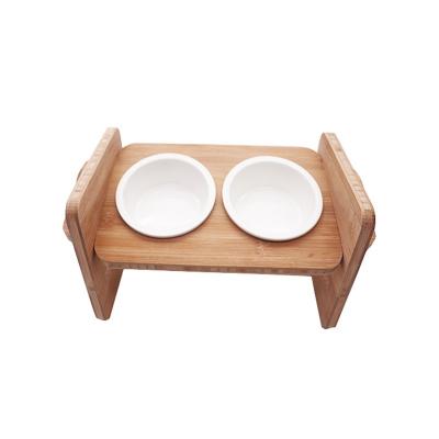 China Pet Feeding Food Made Stylish Solid Bamboo Elevated Feeder Stand with Ceramic Bowl for sale