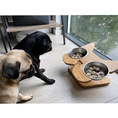 China Comedor de bambú para mascotas con cuencos de agua y comida de acero inoxidable en venta