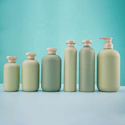 China Matte Green Plush Cosmetic HDPE Soft Touch Squeeze Shampoo Bottle Plastic Body Packaging Lotion Bottles 200ml 250ml 400ml 500ml for sale