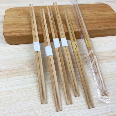 中国 Disposable 50 Pair Double Tip Disposable Carbonized Chopsticks Custom Printed Disposable Sushi Set Chopsticks Bamboo Personalized Chopst 販売のため