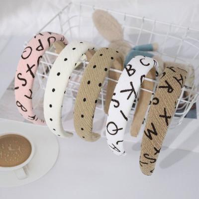 China New Handmade Polka Dot Alphabet Sponge Headbands Fabric Headdress Wide-edged Letter Headbands For Women for sale