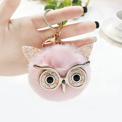 China Bag decoration design new colors owl pom charm keychain tassel key chain pendant pom fluffy cute animal for sale