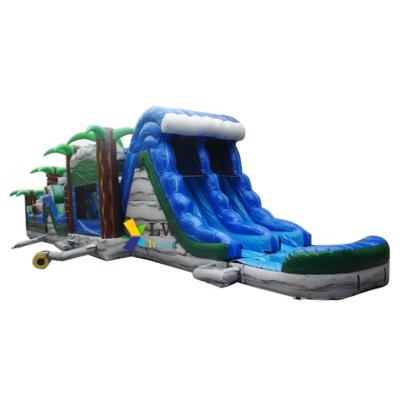 China Fast Games 2021 Indoor Inflatable New Design Tropical Obstacle Course With Inflatable Slide For Kids And Adults for sale