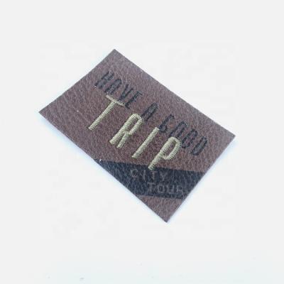 China Viable Custom Real Leather Logo Print Black Logo Thin Labels Embroidery On Leather Patches for sale