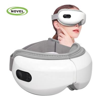 China Voice Indicator 4D Electric Eye Care Massage Machine Air Pressure Heating Infrared Eye Massager Products for sale