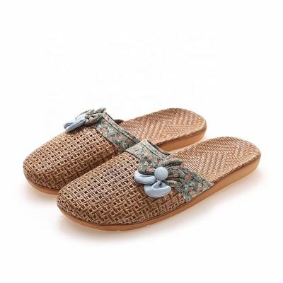 China Breathable and Lightweight Sweat-absorbent Rattan Mat with Cute Flower Women's Slippers Sandals Small Flat Canvas Slippers Female for sale