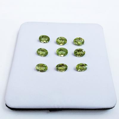 China Color Set Or Fire Maker 3*4mm-8*10mm Oval Cut Loose Natural Peridot Gemstone for sale