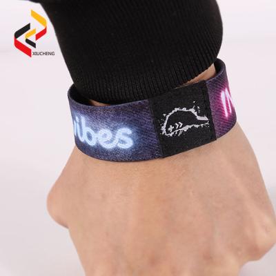 China Silk printing smart chip silicone rubber elastic RFID wristband for sale