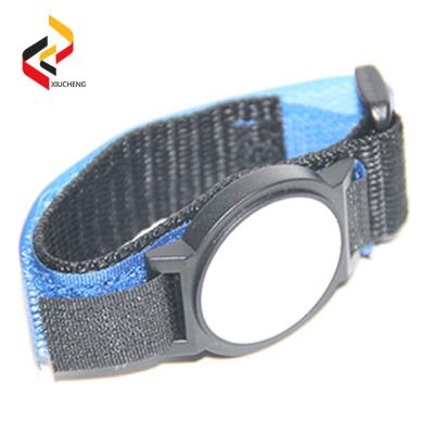 China NXP MIFARE S50 Nylon RFID wristband with embossed band for festival for low cost for sale