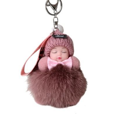 China Cute Fluffy Sleeping Baby Pom Pom Ball Bag Charm Party Fox Fur Pendant - Custom Plush Doll Key Chain for sale