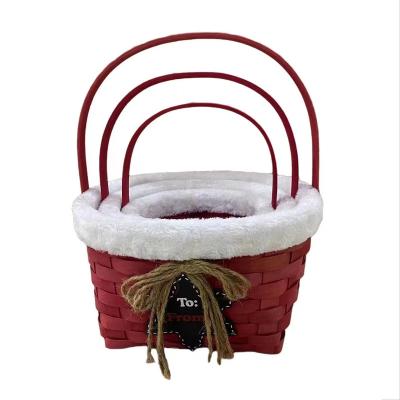 China Christmas sustainable red round basket with six-pointed star silk bowknot and white border for sale